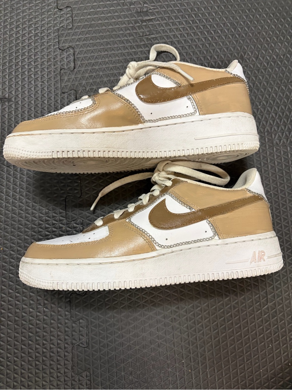 customized Nike Air Force 1 trainers in a beige, brown, and white